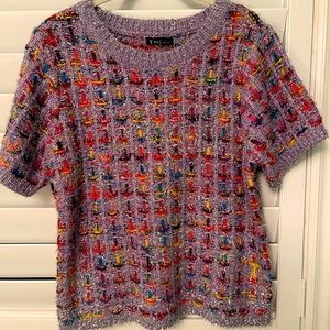 Adorable tweed like sweater top. Perfect for the holiday season!